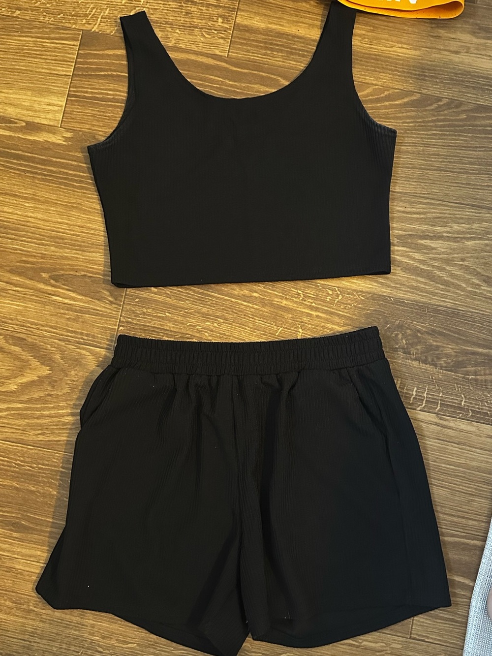 Black Ribbed Tank and Shorts Set fits better as a large